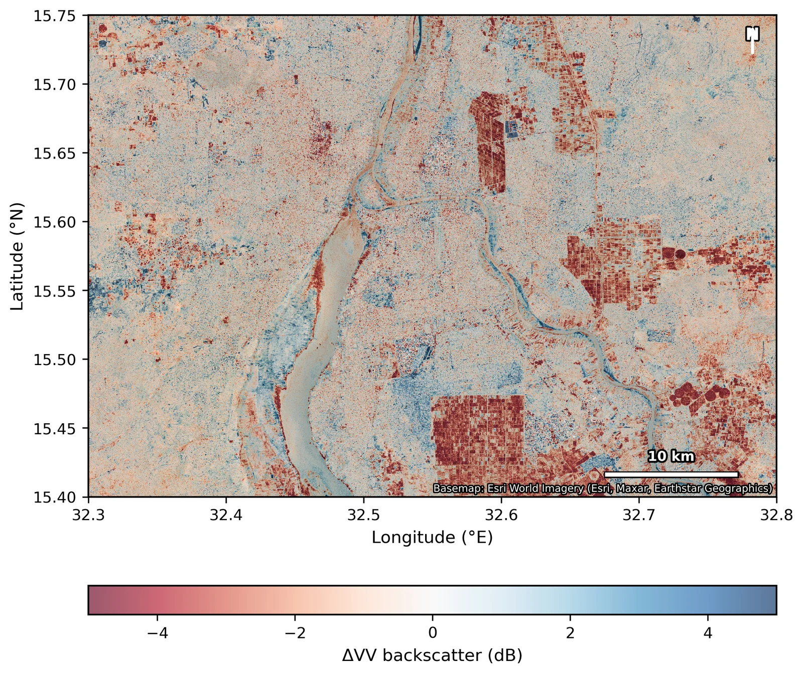 Sentinel-1 radar backscatter change map of Khartoum, 2025 minus 2021, with red patches of loss in the city and in field-shaped blocks outside it.